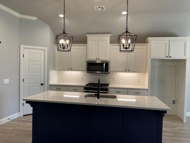 Building Photo - Deer Creek Schools! Storm Shelter, great colors, lots of light, swim, workout and play right in t...