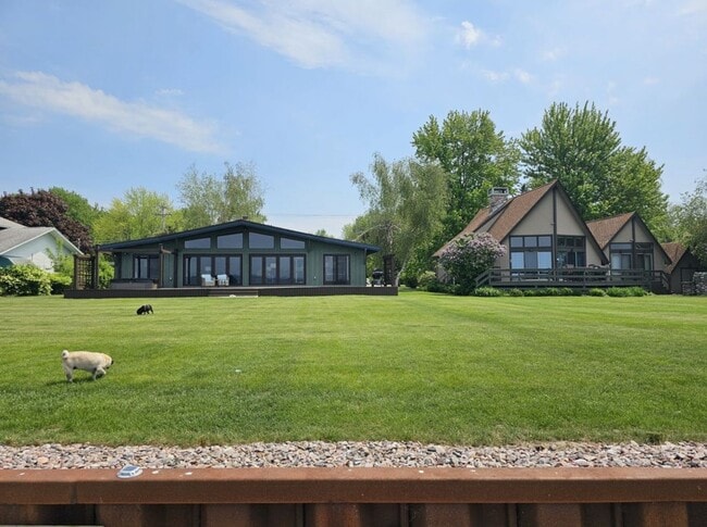 Building Photo - Offered for Rent – Available April 1, 2026 St. Lawrence Seaway Luxury Waterfront Home – Cape Vinc...