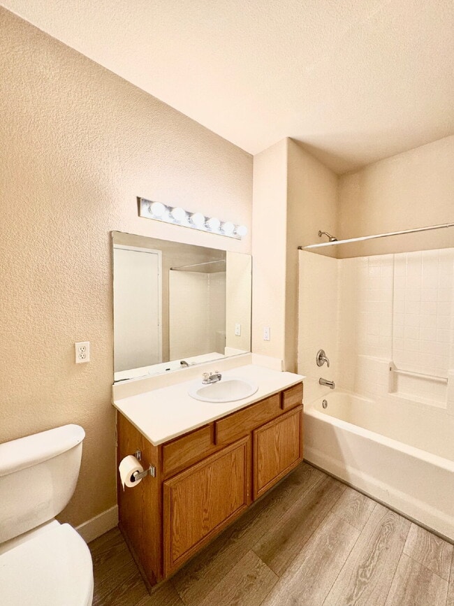 Building Photo - DOWNSTAIRS CONDO | GATED COMMUNITY | CENTENNIAL HILLS | UPDATED 3 BEDROOM