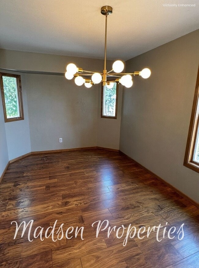 Building Photo - 6367 Woodman Dr