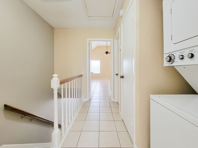 Building Photo - Welcome to This Charming Townhome Nestled ...