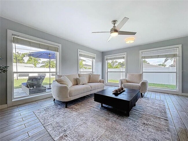 Building Photo - Modern luxury meets Florida charm in this ...