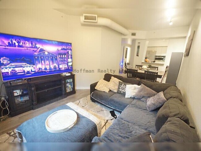 Building Photo - Experience the SoHo Lifestyle in the Heart...