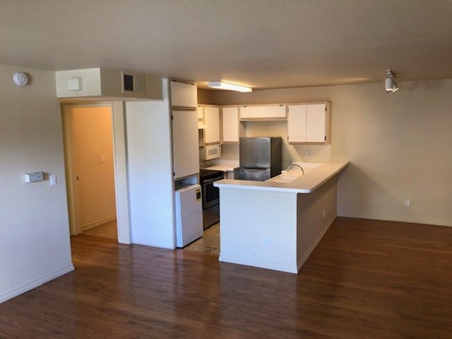 Building Photo - 1 Bedroom Luxury Living . . .  with 2 gated parking spots