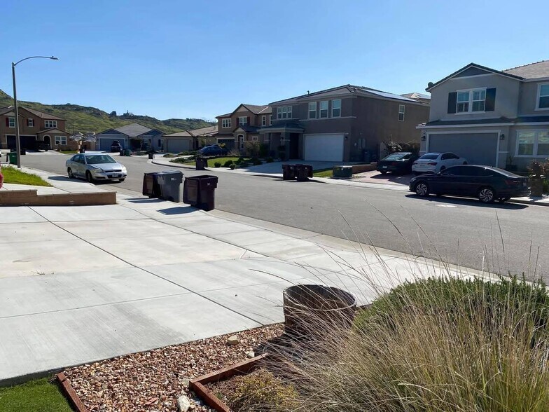2 car garage included. And additional parking on driveway and street - 7893 Boot Straps Ct