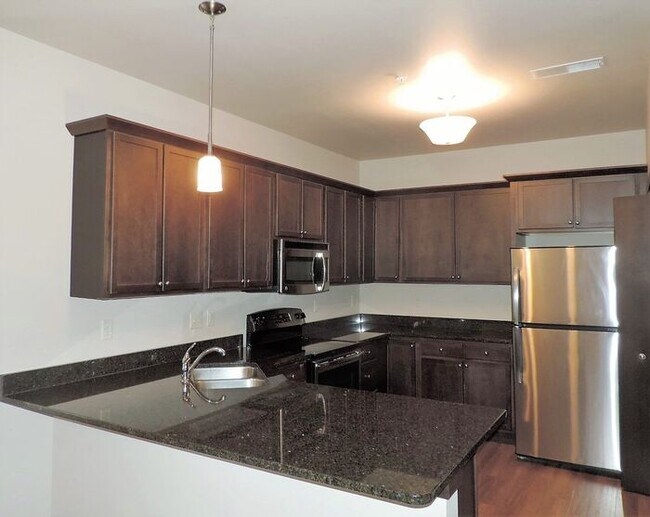 Building Photo - $1,635 | 2 Bedroom, 2 Bathroom 2nd Floor Condo | Pet Friendly* | Available for August 1st, 2026 M...