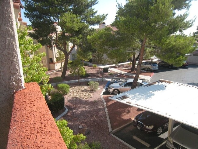 Building Photo - 2nd Story Condo in gated community close to the pool.