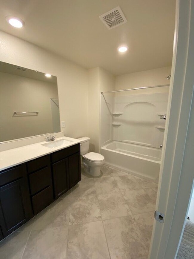 Building Photo - Beautiful Townhome in a Gated Community with 2-Car Garage!!