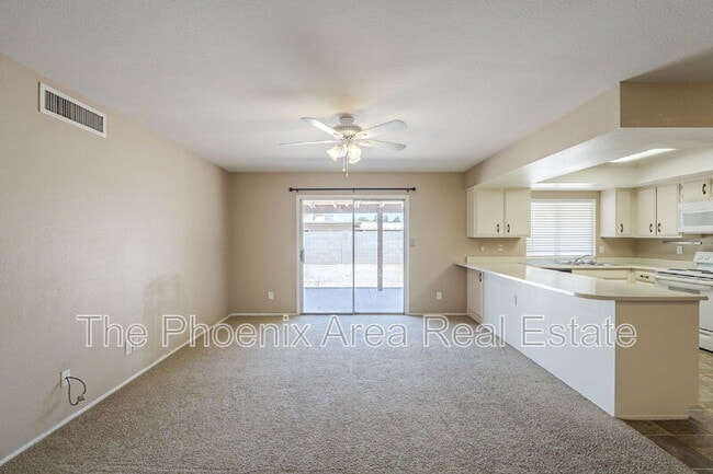 Building Photo - 1556 W Peralta Ave