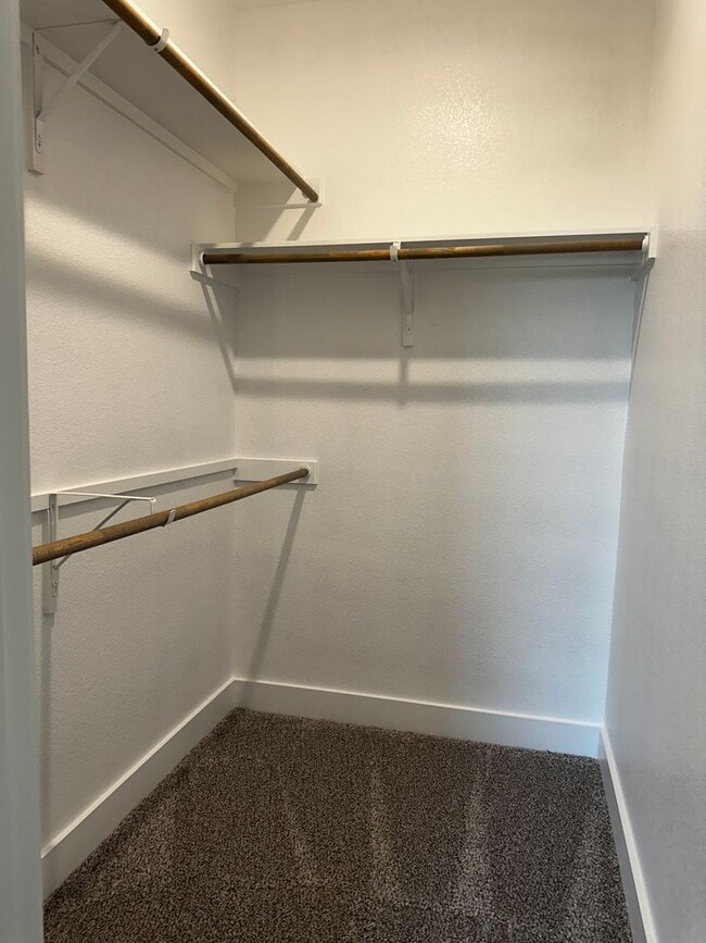 Building Photo - For Lease – Modern 2023 Condo Backing to Greenbelt | Creekside at Pioneer Crossing West