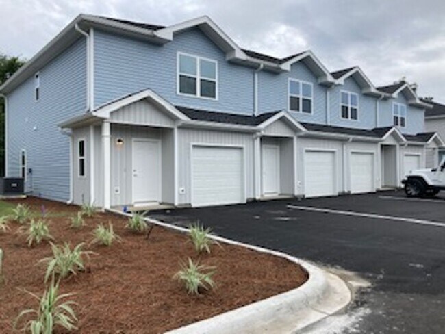Building Photo - Brand New Build- 3 Bedroom 2.5 bath townhome.