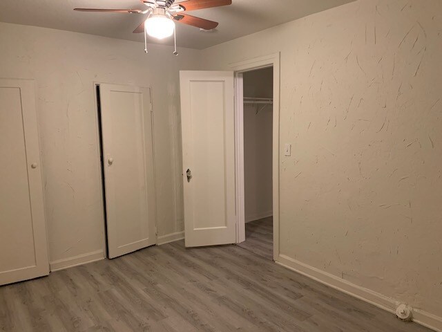 View of bedroom door (to the right) and closet door (closet is really big and spans the entire wall) - 24606 University Ave