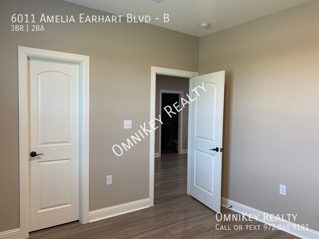 Building Photo - 6011 Amelia Earhart Blvd