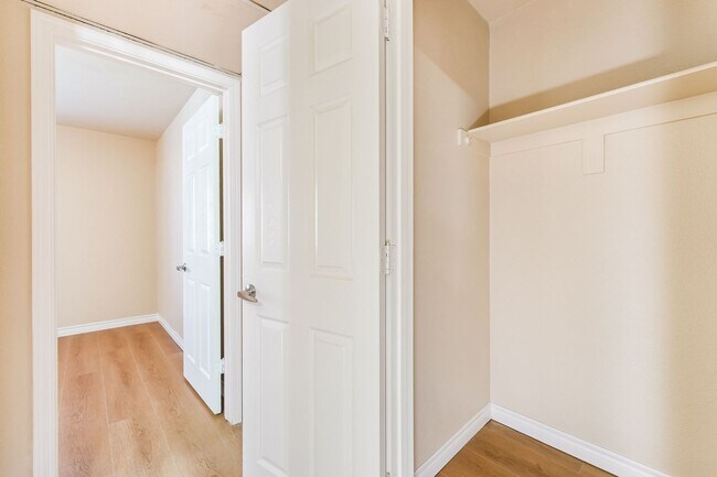 Building Photo - Bright & Charming Condo with Hardwood Floors and Included Appliances!