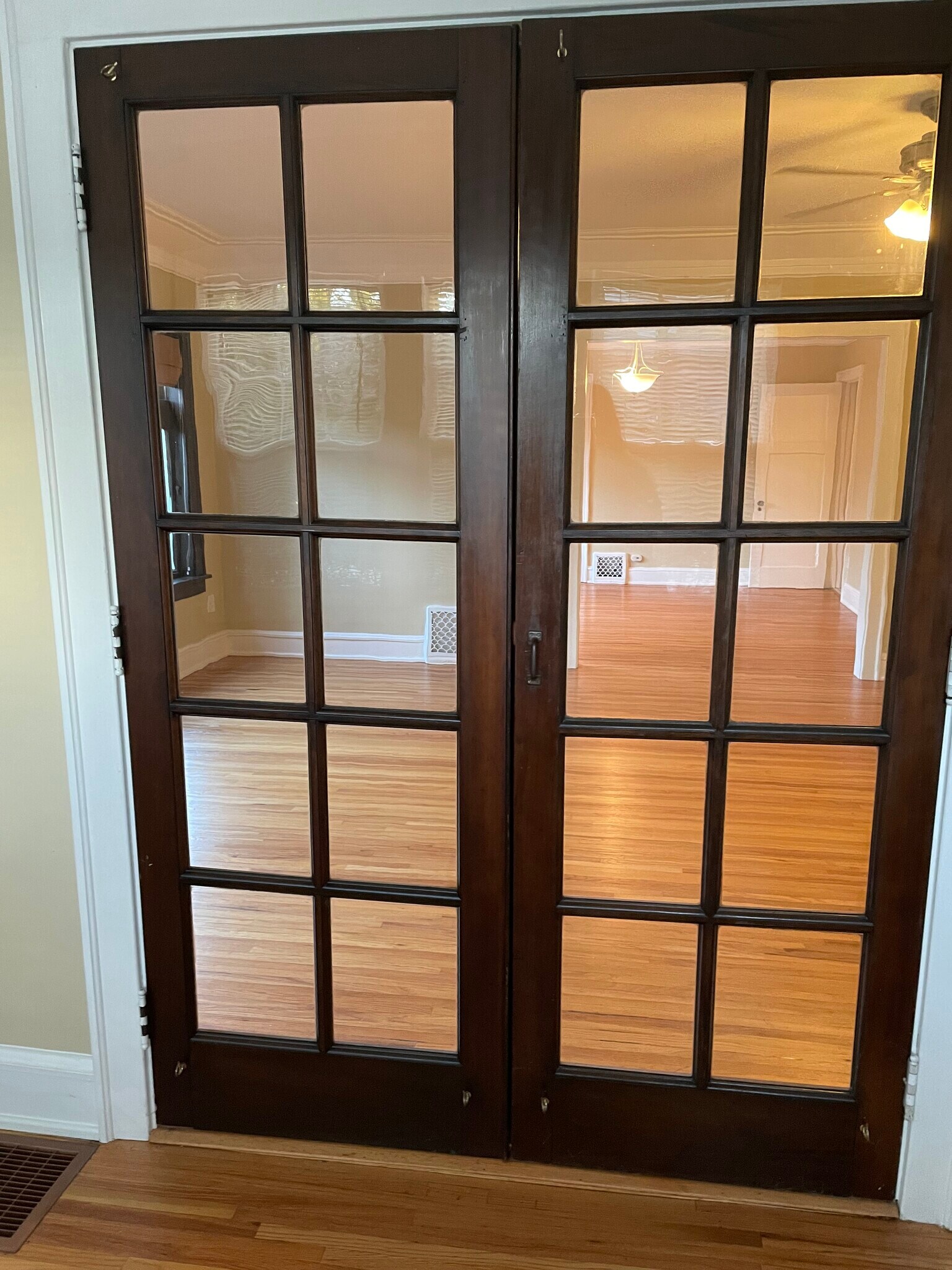 glass doors to both living rooms - 2523 LeClaire St
