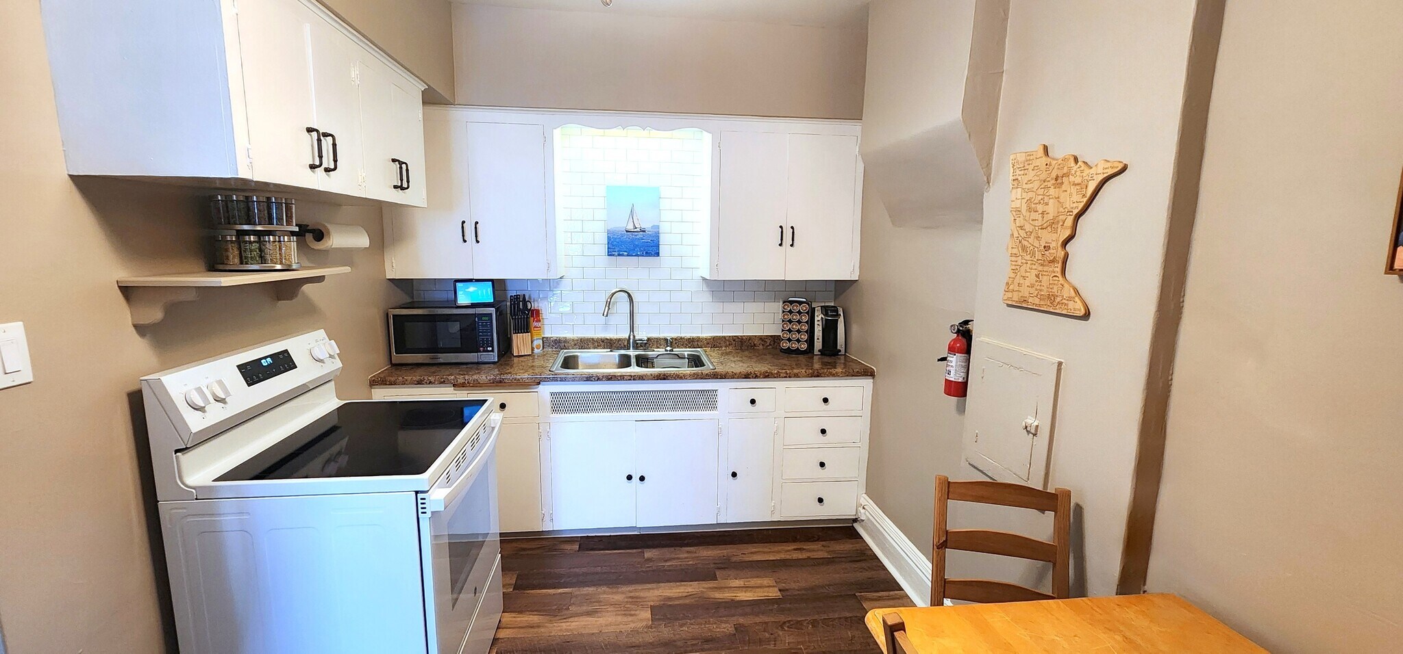 "A touch of lake life." The sailboat and white tile bring Duluth’s charm right to the sink. - 822 E 4th St