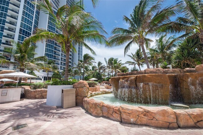 Building Photo - 18201 Collins Ave