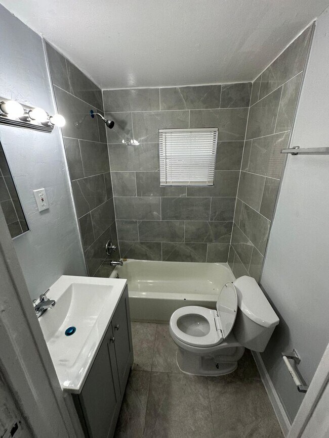 Building Photo - Fully Renovated 2/1 -Single Family Availab...