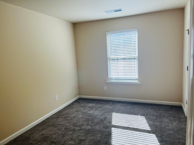 Building Photo - Wow! Check out this charming 3-bedroom, 2....