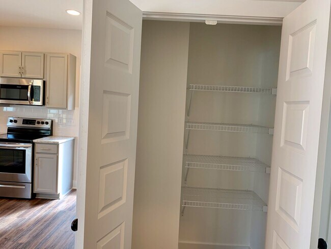 Building Photo - One level home with GARAGE and FENCED BACKYARD!