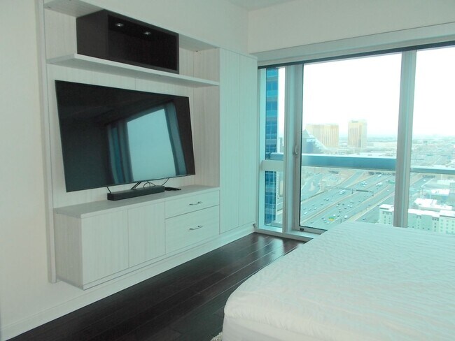 Building Photo - Experience elevated high-rise living at The Martin.