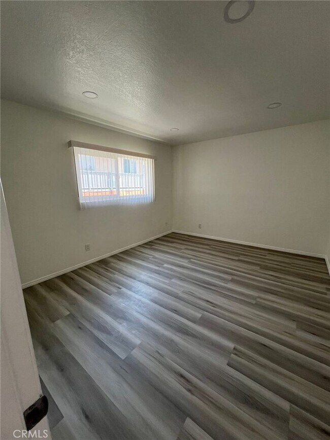 Building Photo - 7039 Remmet Ave