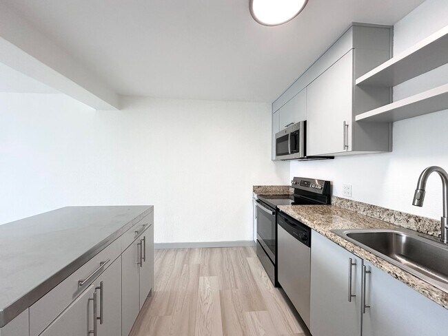 Building Photo - Newly Remodeled 1 bed 1 bath Condo in Down...