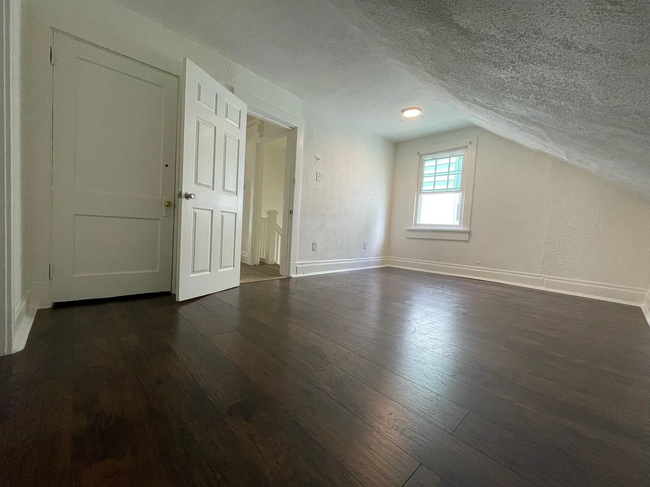 3rd floor rear bedroom looking from back wall - 5859 Nicholson St