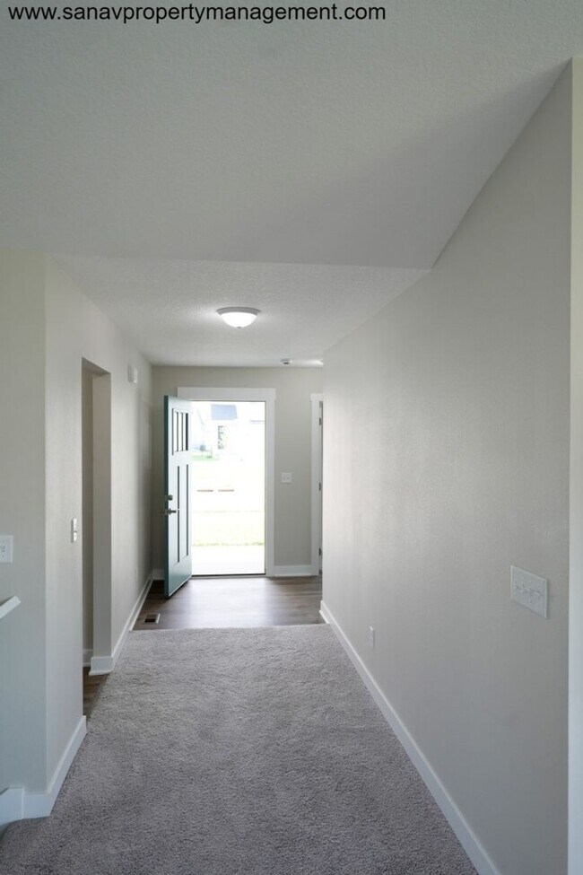 Building Photo - "Modern Comfort Meets Convenience: Your Ideal Home in Waukee"