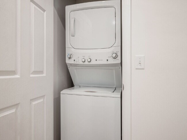 Building Photo - Half Month FREE — Updated 2BR w/ In-Unit Laundry, Central A/C + 2 Parking Spots | Touring starts ...