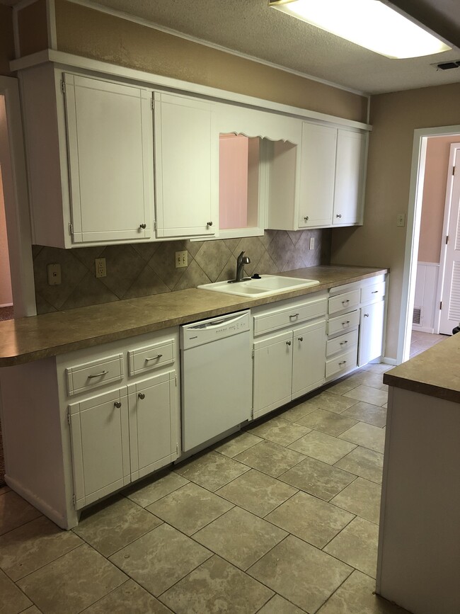 Kitchen view from Garage entry - 8309 Geneva Ave