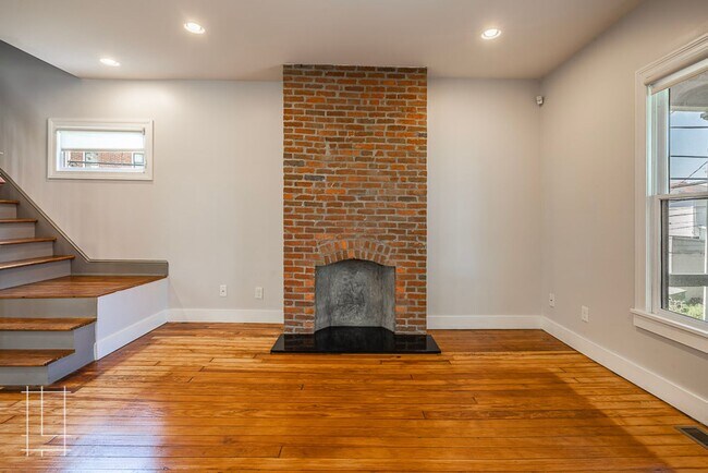 Building Photo - Available Now: One Month Free Rent!