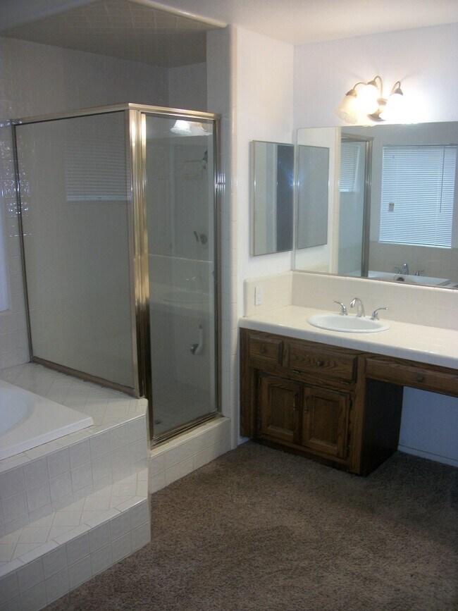 Building Photo - Coming Soon: Spacious Renovated 3 Bedroom Rosedale Home with Pool, Dual Fireplaces & Covered Patio