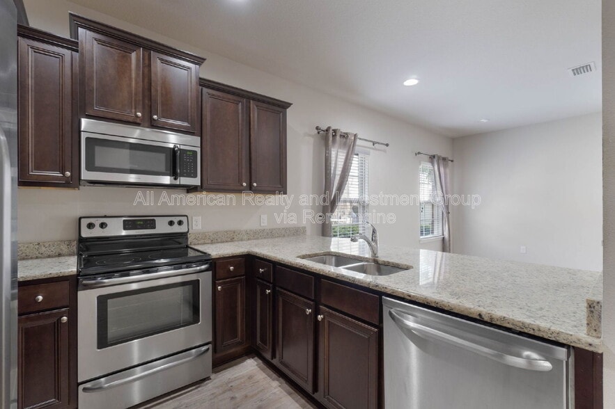 Building Photo - 8827 Little Cormorant Ln