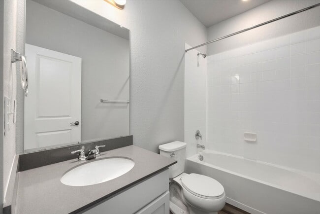 Building Photo - Gorgeous NEW Three Story Townhome with two car attached garage!