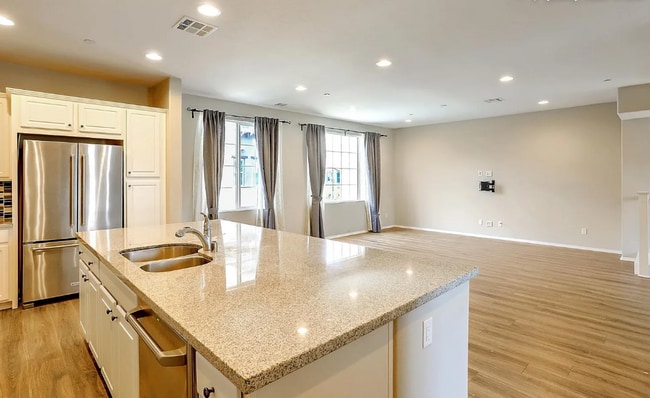 Building Photo - This gorgeous 3-bedroom, 3.5 bath townhome...