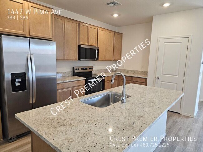 Building Photo - 1447 W Pima Ave