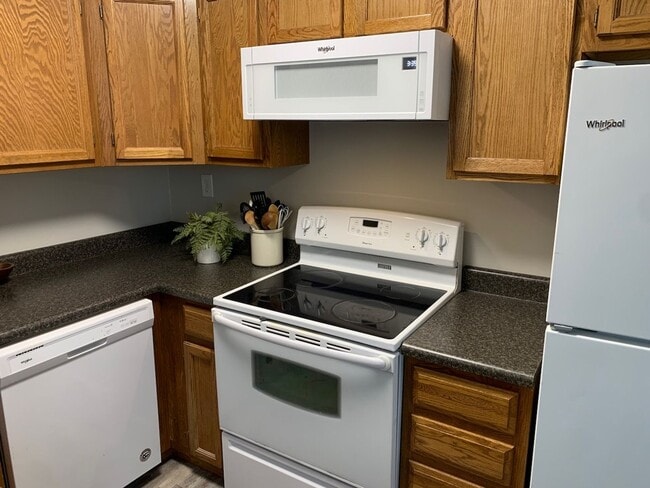 Building Photo - Updated 2BR/1.5BA with garage, lawn care included