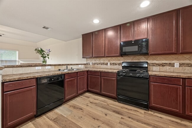 Building Photo - 15319 Meandering Post Trl