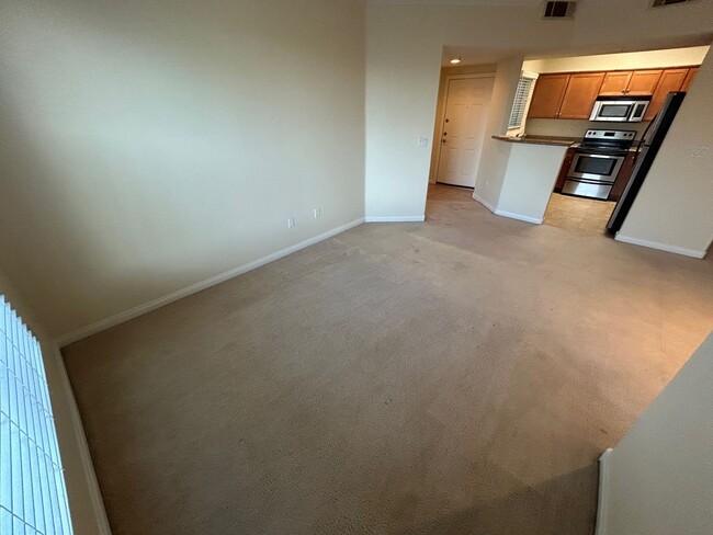 Building Photo - ADORABLE 2 BEDROOM 2 BATHROOM CONDO LOCATED IN A GATED COMMUNITY