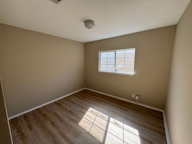 Building Photo - NEW PAINT, FLOORING, APPLIANCES & ROOF  | ...