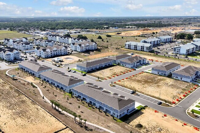 Building Photo - Beautiful New 3-Bedroom Townhome in Davenport — Includes Resort Pool, Modern Clubhouse & Family P...