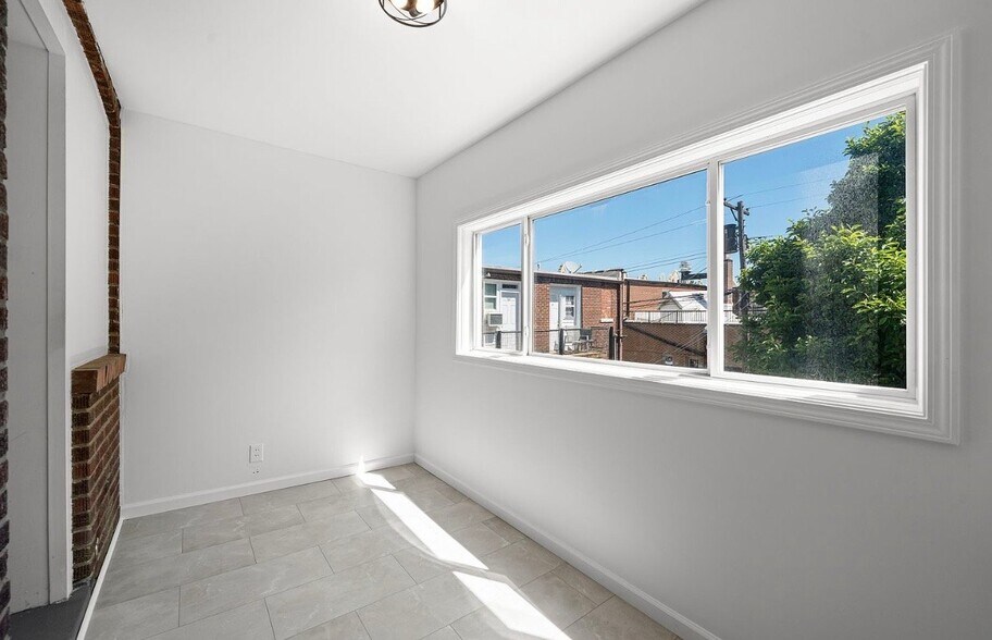 Building Photo - 5006 Tholozan Ave