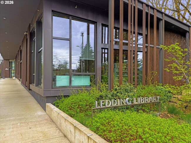 Building Photo - Main Street Living with Granite Kitchen, Gas Fireplace, and MAX Line Access