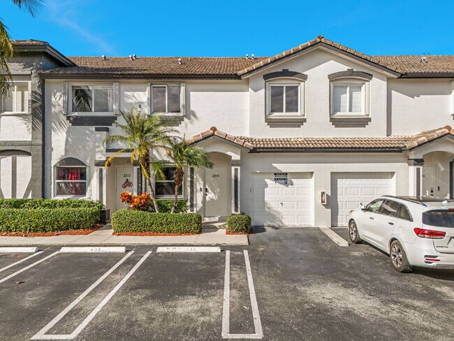 Building Photo - Stunning lakefront townhouse in gated Homestead community.