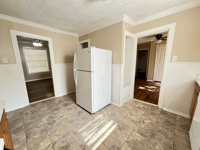 Building Photo - Denton Charmer with Big Yard, Carport & Flexible Living Space