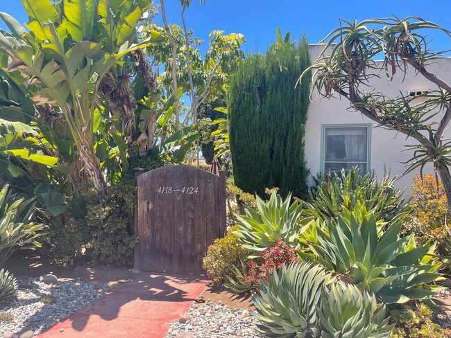 Building Photo - Charming 1-Bedroom Garden Cottage w/Garage...