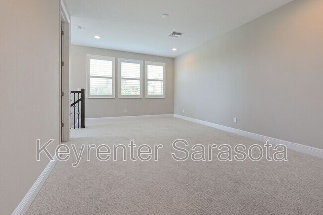 Building Photo - 6133 Lungo Lago Dr