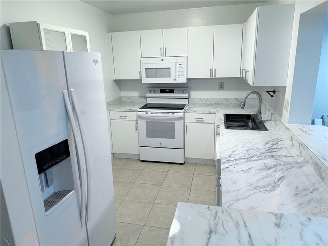 Building Photo - 4394 NW 9th Ave