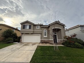 Building Photo - Gated 3BR|2.5BA|1508SF|2 Car Garage| Tenant pays $175 for WS&G | Community Pool, Clubhouse, & Fis...